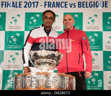 French Davis Cup captain Yannick Noah and Belgian captain Johan Van Herck pictured during the draw ahead of the Davis Cup World Group final between France and Belgium, Thursday 23 November 2017, in Villeneuve-d'Ascq. The Davis Cup game will be played from 24 to 26 November 2017 in stade Pierre-Mauroy in Lille, France. BELGA PHOTO BENOIT DOPPAGNE Stock Photo