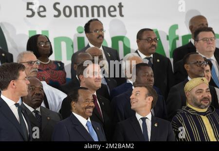 Prime Minister of the Netherlands Mark Rutte, Prime Minister of Luxembourg Xavier Bettel, President of France Emmanuel Macron and Morroco's king Mohammed VI pose for a family photo on the first day of an European - Africa summit in Abidjan, Ivory Coast, after a two days visit of the Prime Minister in Bamako, Mali, Wednesday 29 November 2017. BELGA PHOTO BENOIT DOPPAGNE Stock Photo