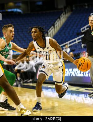 Greensboro Coliseum, Greensboro, NC, USA. 13th Dec, 2022. UNC-Greensboro senior Keyshaun Langley (0) drives to the basket against Marshall. NCAA basketball game between Marshall University and UNC-Greensboro at Greensboro Coliseum, Greensboro, NC. Final score was UNC-Greensboro 76 and Marshall 67. David Beach/CSM/Alamy Live News Stock Photo