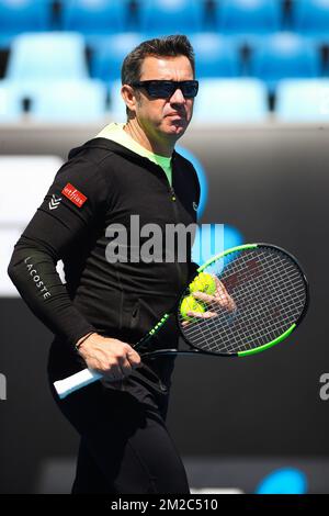 Goffins Trainer Thierry Van Cleemput wurde bei einem Training vor dem Start der „Australian Open“ Tennis Grand Slam am Sonntag, den 14. Januar 2018 in Melbourne Park, Australien, fotografiert. Dieser erste Grand Slam der Saison findet vom 15. Bis 28. Januar statt. BELGA FOTO PATRICK HAMILTON Stockfoto