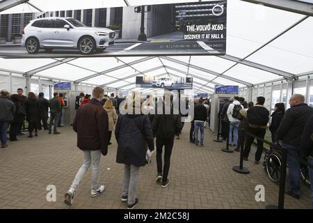 Illustration picture shows people queuing at the entrance of the 96th edition of the Brussels Motor Show, at Brussels Expo, on Sunday 14 January 2018, in Brussels. BELGA PHOTO NICOLAS MAETERLINCK Stock Photo