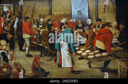 Bauernhochzeit in einer Scheune, Ölgemälde aus dem 17.. Jahrhundert des flämischen Malers aus der Nördlichen Renaissance Pieter Brueghel the Younger / Pieter Bruegel The Younger | Repas de Noces dans la grange par Pieter Brueghel le Jeune / Brueghel d'Enfer, peintre brabancalon de la Renaissance 18/03/2018 Stockfoto