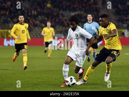 Saudi Arabia's defender Yasser Al-Shahrani and Belgium's Anthony Limbombe pictured in action during a friendly game between the Red Devils Belgian National soccer team and Saudi Arabia, in Brussels, Tuesday 27 March 2018. BELGA PHOTO DIRK WAEM Stock Photo