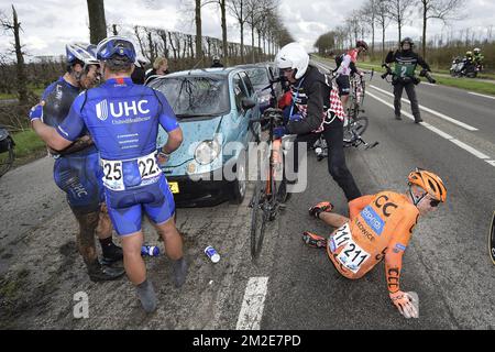 American Travis McCabe of UnitedHealthcare, American Eric Marcotte of UnitedHealthcare and Slovenian Marko Kump of CCC Sprandi Polkowice pictured after a crash during the 106th edition of the 'Scheldeprijs' one day cycling race, 200,4 km from Borsele to Schoten, Wednesday 04 April 2018. BELGA PHOTO YORICK JANSENS Stock Photo