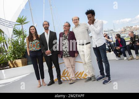 Michel TOESCA, Cedric Herrou and guests attends the 'Libre' Photocall during the 71st annual Cannes Film Festival at Palais des Festivals | Michel TOESCA, Cedric Herrou et des invités assistent au Photocall de 'Libre' lors du 71ème Festival de Cannes au Palais des Festivals. 18/05/2018 Stock Photo