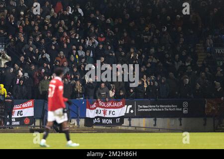 Bolton, UK. 13th Dec, 2022. Manchester United fan's during the Papa John's Trophy match Bolton Wanderers vs Manchester United U21 at University of Bolton Stadium, Bolton, United Kingdom, 13th December 2022 (Photo by Phil Bryan/News Images) in Bolton, United Kingdom on 12/13/2022. (Photo by Phil Bryan/News Images/Sipa USA) Credit: Sipa USA/Alamy Live News Stockfoto