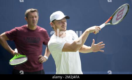 Goffin's coach Thierry Van Cleemput and Belgian David Goffin pictured during a training session ahead of the 118th US Open Grand Slam tennis tournament, at Flushing Meadow, in New York City, USA, Friday 24 August 2018. BELGA PHOTO YORICK JANSENS Stock Photo