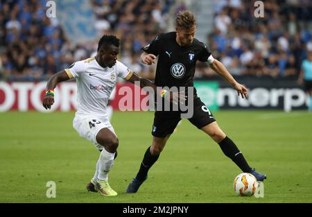 Genk's Joseph Aidoo and Malmo FF's forward Markus Rosenberg fight for the ball during the match between Belgian soccer team KRC Genk and Swedish club Malmo FF in Genk, Thursday 20 September 2018, on day one of the UEFA Europa League group stage. BELGA PHOTO VIRGINIE LEFOUR Stock Photo