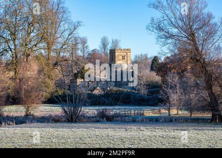 Anglican Church of St James in the frost. Coln St. Dennis, Cotswolds, ,Gloucestershire, England Stock Photo