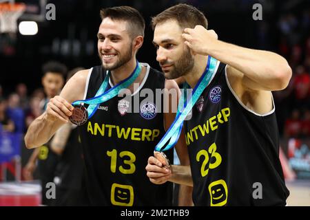 Antwerp's Yoeri Schoepen and Antwerp's Dave Dudzinski pictured with the bronze medal after winning a basketball match between Antwerp Giants and German team Brose Bamberg, the match for the third place of the 'Final Four' of the men's Champions League basketball competition, Sunday 05 May 2019 in Antwerp. BELGA PHOTO DAVID PINTENS Stock Photo