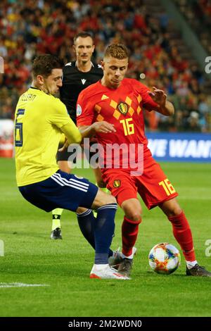 Scotland's Kenny McLean and Belgium's Thorgan Hazard fight for the ball during a soccer game between Belgian national team the Red Devils and Scotland, Tuesday 11 June 2019 in Brussels, an UEFA Euro 2020 qualification game. BELGA PHOTO BRUNO FAHY Stock Photo