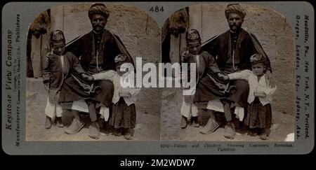 Father and children, showing costumes, Ramallah, Palestine , Families, Clothing & dress Stock Photo