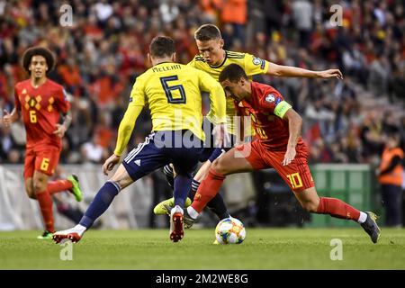 Scotland's Kenny McLean and Belgium's Eden Hazard fight for the ball during a soccer game between Belgian national team the Red Devils and Scotland, Tuesday 11 June 2019 in Brussels, an UEFA Euro 2020 qualification game. BELGA PHOTO DIRK WAEM Stock Photo