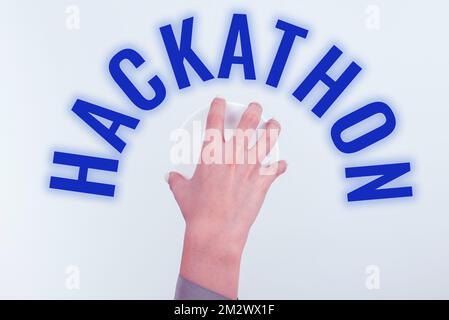 Schild mit Hackathon. Ein Wort für ein Ereignis, bei dem eine große Anzahl von Menschen an der Programmierung beteiligt ist Stockfoto