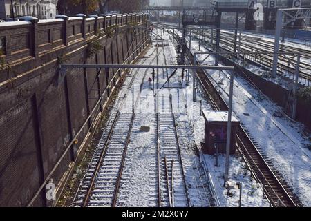 London, UK. 14th December 2022. Empty train tracks in Camden are covered in snow and ice as the rail strikes continue across the UK amid freezing temperatures. Credit: Vuk Valcic/Alamy Live News Stock Photo