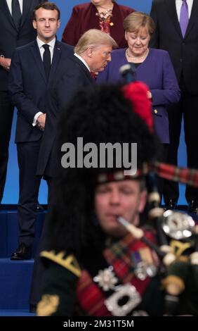 Der Präsident Frankreichs Emmanuel Macron, der US-Präsident Donald Trump und die deutsche Kanzlerin Angela Merkel bildeten sich im Vorfeld des ersten Tages des NATO-Ministertreffens in London, England, Dienstag, den 03. Dezember 2019. BELGA FOTO BENOIT DOPPPAGNE Stockfoto