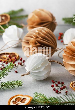 Handmade Christmas Honeycomb ball made from white und brown coffee filter. Scandinavian Nordic Craft Paper concept. Selective focus. Stock Photo