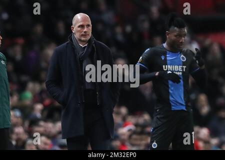 Der Cheftrainer von Club Brügge, Philippe Clement, und Simon Deli vom Club, wurden während des Rückspiels im Finale der UEFA Europa League 1/16 zwischen dem belgischen Fußballverein Club Brügge und dem englischen Verein Manchester United, in Manchester, Großbritannien, am Donnerstag, den 27. Februar 2020, abgebildet. BELGA FOTO BRUNO FAHY Stockfoto