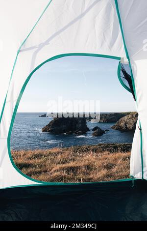 A view from tent window to famous places of the island Belle Ile en Mer, Needles of Port-Coton and the cliffs Stockfoto