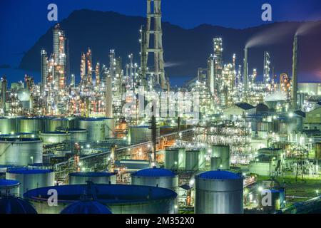 Oil refineries illuminated at night in Wakayama, Japan. Stock Photo