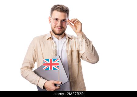 Mann mit Laptop und englischer Flagge Stockfoto