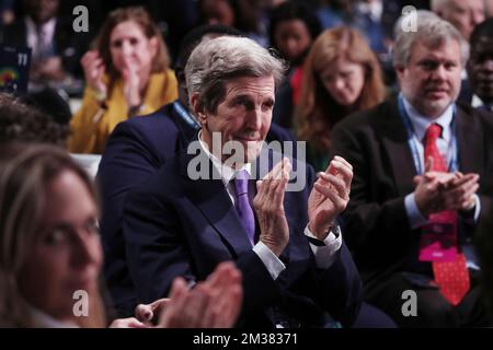 Washington, DC, USA. 14th Dec, 2022. United States Special Presidential Envoy for Climate and former US Secretary of State John Kerry (C) listens to US President Joe Biden (not pictured) deliver remarks at the US-Africa Business Forum during the US-Africa Leaders Summit, at Walter E. Washington Convention Center in Washington, DC, USA, 14 December 2022. Credit: Michael Reynolds/Pool via CNP/dpa/Alamy Live News Stock Photo