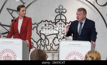 (221214) -- COPENHAGEN, Dec. 14, 2022 (Xinhua) -- Leader of the left-wing Social Democratic Party Mette Frederiksen (L, Rear) and leader of the Moderates Lars Lokke Rasmussen (R, Rear) attend a press conference at Marienborg in Denmark, on Dec. 14, 2022. Six weeks after Denmark's general election, acting Prime Minister Mette Frederiksen outlined the agreement on Wednesday for a new centrist government coalition. Frederiksen, leader of the left-wing Social Democratic Party, will stay as prime minister for a second term, leading a coalition with the liberals (Venstre) headed by Jakob Ellemann-Je Stock Photo