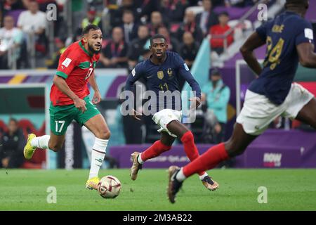 Sofiane Boufal of Morocco, Ousmane Dembele of France during the FIFA World Cup 2022, Semi-final football match between France and Morocco on December 14, 2022 at Al Bayt Stadium in Al Khor, Qatar - Photo: Jean Catuffe/DPPI/LiveMedia Stock Photo