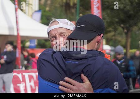 Malaga, Spain. 11th Dec, 2022. A 73 year old man seen celebrating with his grandchild during the Generali Marathon 2022 in Malaga. (Photo by Francis Gonzalez/SOPA Images/Sipa USA) Credit: Sipa USA/Alamy Live News Stock Photo