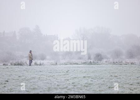 Chester, UK. 12th Dec, 2022. A walker braves the elements as temperatures plumet to -5ºc and freezing fog engulfs the countryside around the city of Chester. Credit: Simon Hyde/Alamy Live News. Stock Photo