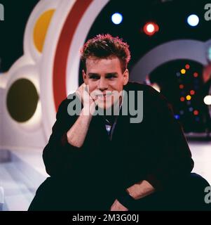 Die Spiebude, ARD Spielshow, Deutschland, 1984, mit Al Corley, Amerikanischer Schauspieler und Sänger. Spielbude, TV-Musikshow, Deutschland, 1984, mit Al Corley, Amerikanischer Schauspieler und Sänger. Stockfoto