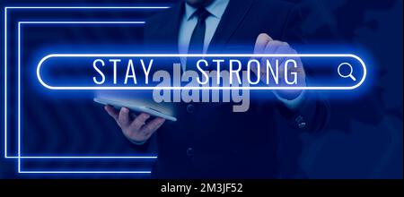 Schilder zeigen „Stay Strong“ an Das Internet-Konzept hat Klarheit und gibt nie auf, was man sich vom Leben wünscht Stockfoto