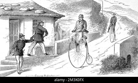 Radfahrer an einer europäischen Grenze auf einem Penny Farthing Stockfoto