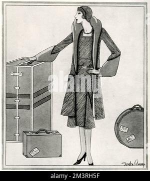 Ein Reiseanzug in Braun und Weiß. Der Mantel ist aus Tweed und der Kittel aus Tweed-Jersey, passend zum Mantel, der mit Biber besetzt ist. Der Hut ist auch aus Tweed. 1929 Stockfoto