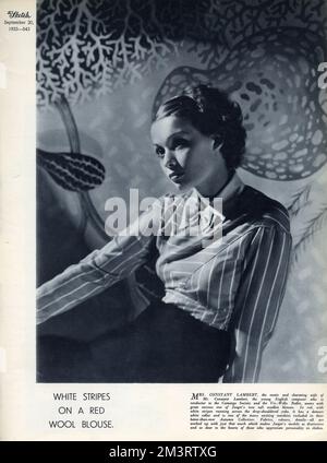 Modeseite, weiße Streifen auf einer roten Wollbluse Stockfoto