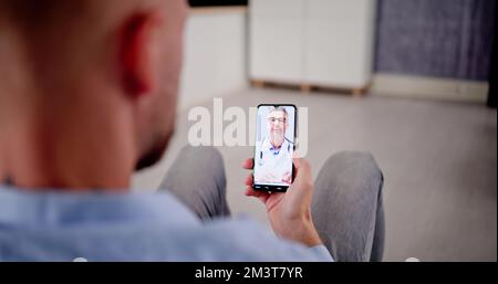 Doktor Video Doktor Auf Telefon Oder Smartphone Stockfoto