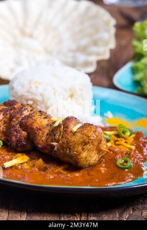 Indische Chicken Tikka Masala auf Holz Stockfoto
