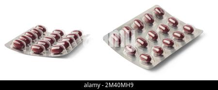 Rote Eisentabletten in Blisterpackungen, Vitaminpillen zur Verbesserung des Eisenspiegels im Blut, medizinische Medikamentenpakete auf weißem Hintergrund isoliert, Sammlung Stockfoto