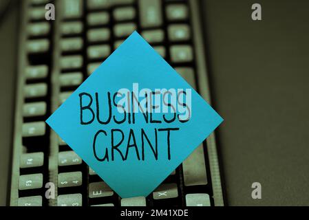Schild mit der Aufschrift „Business Grant“. Wort für Arbeitsstrategien erreicht Ziele Stockfoto