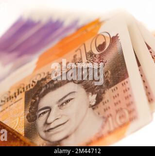 Eine detaillierte Nahaufnahme des neuen fächerten Plastiks GBP 10 zehn Pfund und 20 20 Pfund Schein Währung Stockfoto