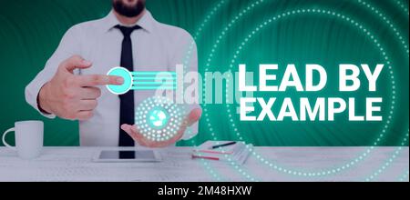 Handschriftliche Texte führen durch Beispiel. Business-Schaufenster Mentor werden Leader Befolgen Sie die Regeln Geben Sie Beispiele Coach Stockfoto