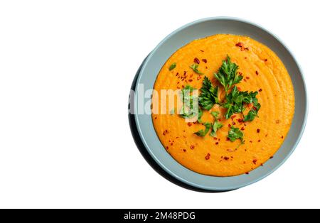 Traditionelle indische Suppenlinsen. Indisches Dhal scharfes Curry in Schüssel Gewürze Kräuter rustikaler isolierter Hintergrund. Authentisches indisches Gericht Stockfoto
