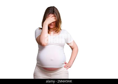 Pension im Gesicht einer schwangeren Frau, Studioaufnahme auf weißem Hintergrund Stockfoto