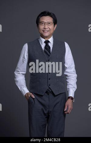 Porträt von zuversichtlich, chinesischer Unternehmer Stockfoto