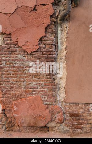 Hintergrundfoto einer alten, robusten texturierten Ziegelwand Stockfoto
