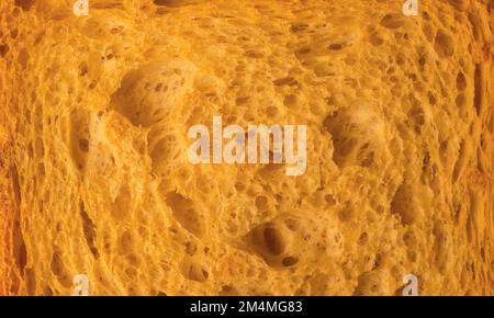 Nahaufnahme einer zwiebrigen Hintergrundstruktur. Textur-Muster für Makro-Brotscheiben Stockfoto