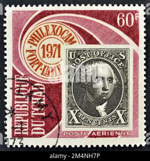 Stornierte Briefmarke gedruckt von Chad, die 10 Centimes schwarze "Washington" U.S zeigt, ungefähr 1971. Stockfoto