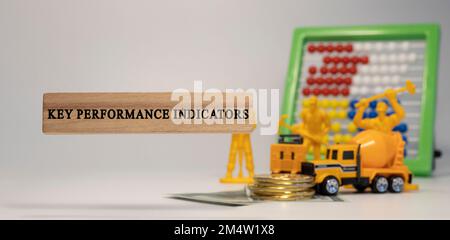 Key Performance Indicators Word. Hintergrundlogbuch auf Holzrahmen geschrieben. Wirtschaft und Finanzen Stockfoto