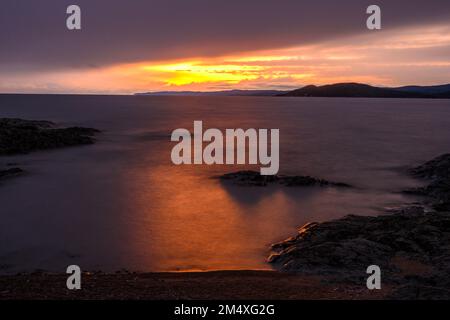 Sonnenuntergang über Lake Superior, Rock Island Lodge, Wawa, Ontario, Kanada Stockfoto