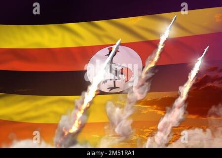 Modernes strategisches Raketenkonzept bei Sonnenuntergang, ugandischer Überschall-Sprengkopf-Angriff - militärisches 3D-Schaubild, Atombombe mit Flagge Stockfoto